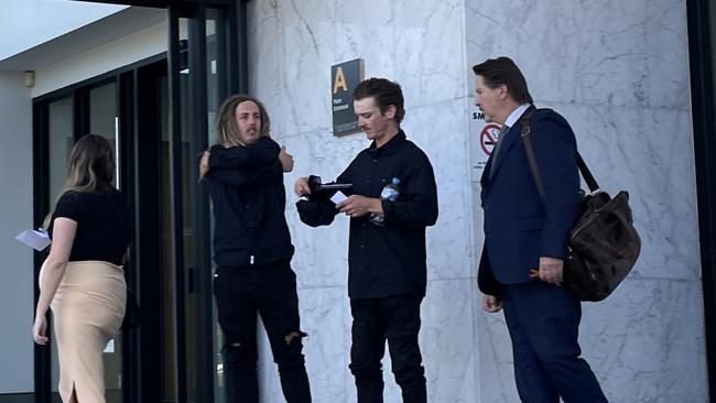 Sakye and Jarden Harvey, who were caught with drugs while visiting Fulham Correctional Centre, pictured at Ballarat Magistrates' Court with lawyer Adrian Paull.