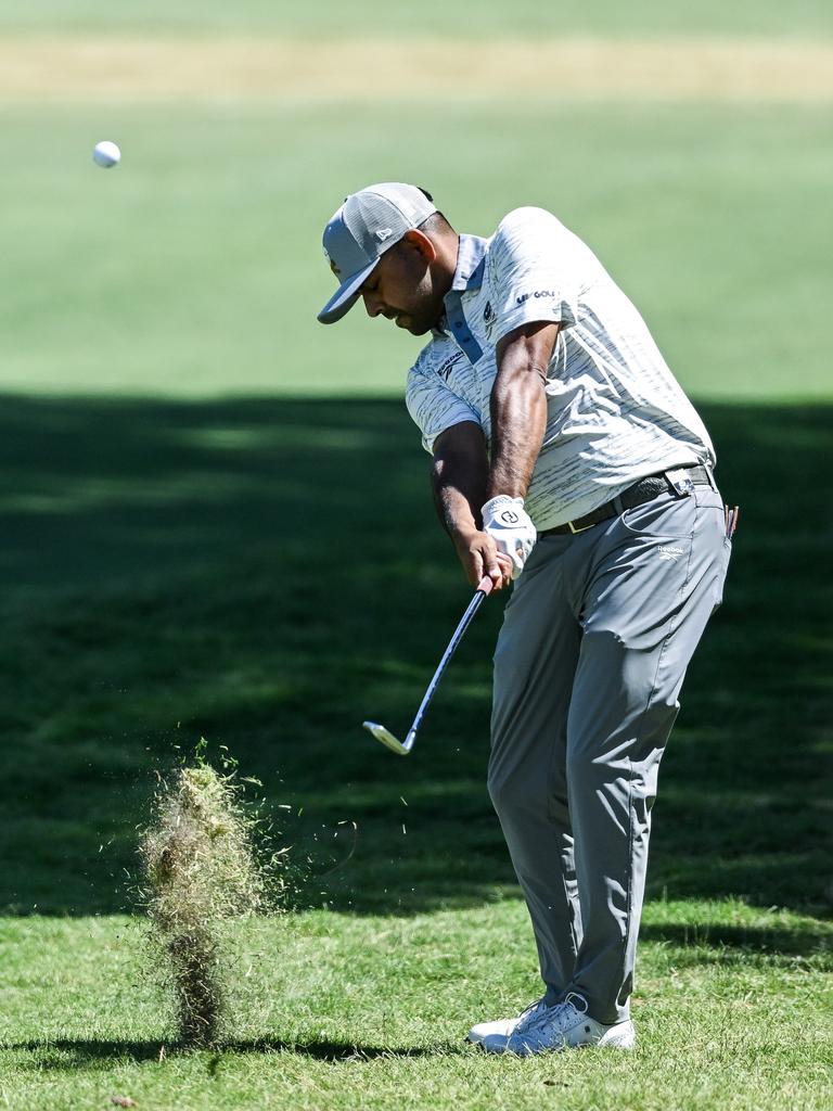 Anirban Lahiri of Crushers hits an iron on the 15th during LIV Golf Adelaide. Picture: Mark Brake/Getty Images