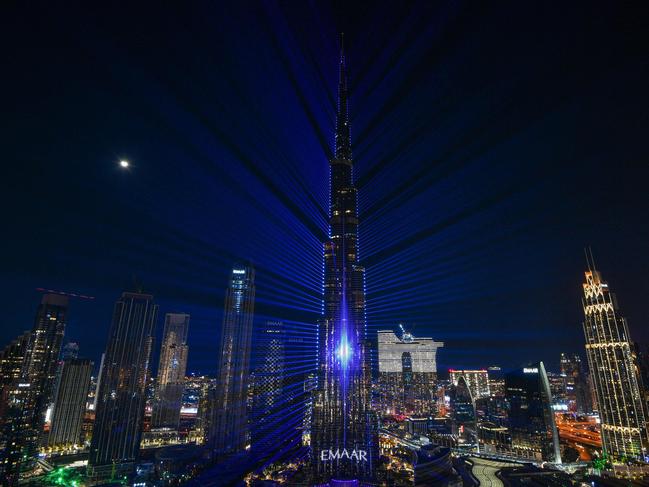 The New Year’s Eve light show illuminates the Burj Khalifa tower. Picture: AFP