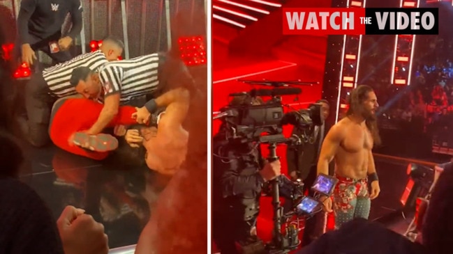 WWE star Seth Rollins tackled by fan in brazen ambush
