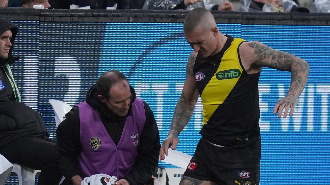 Dustin Martin will miss at least one more game with a back problem after he was subbed out of the round 16 clash against Carlton. Picture: Daniel Pockett / Getty Images