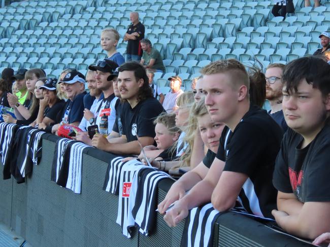 Collingwood fans watch on at the Magpies' open training session at UTAS Stadium on Wednesday. Picture: Jon Tuxworth