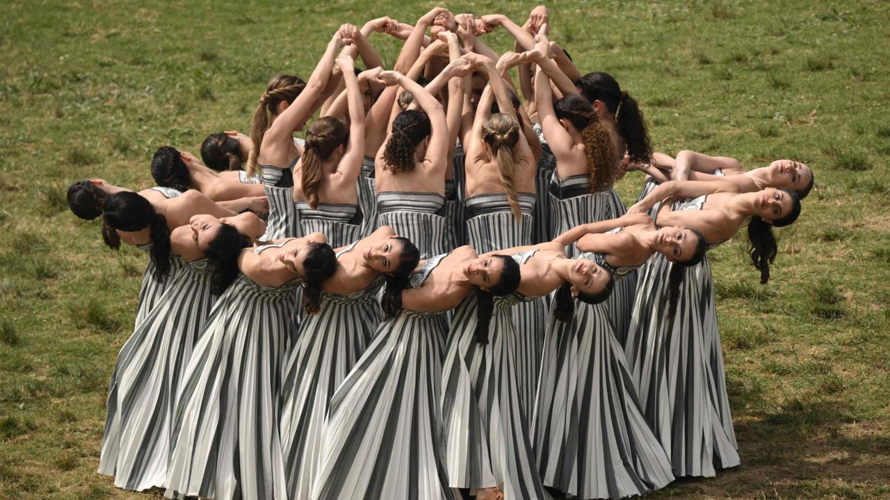 Actors perform during the Olympic flame lighting ceremony for the Paris 2024 Olympic Games at the Ancient Olympia archaeological site, birthplace of the ancient Olympics in southern Greece, on April 16, 2024. Picture: Angelos Tzortzinis/AFP