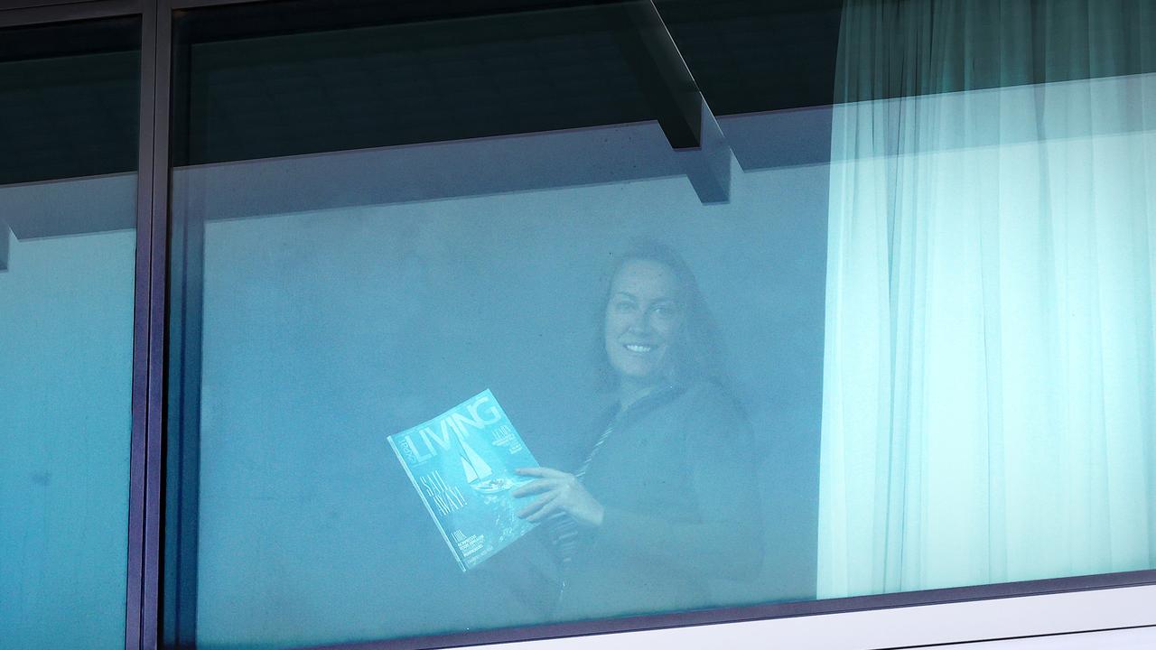 A woman in hotel quarantine at the Brisbane Airport Novotel Hotel, where Covid-19 has spread on floor five. Picture: Liam Kidston