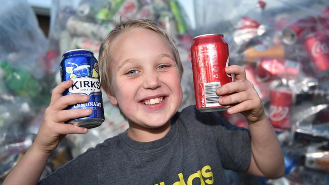 Caboolture nine-year-old Reegan Pellowe is collecting cans and bottles to raise money for sick children. Photo: Luke Simmonds.