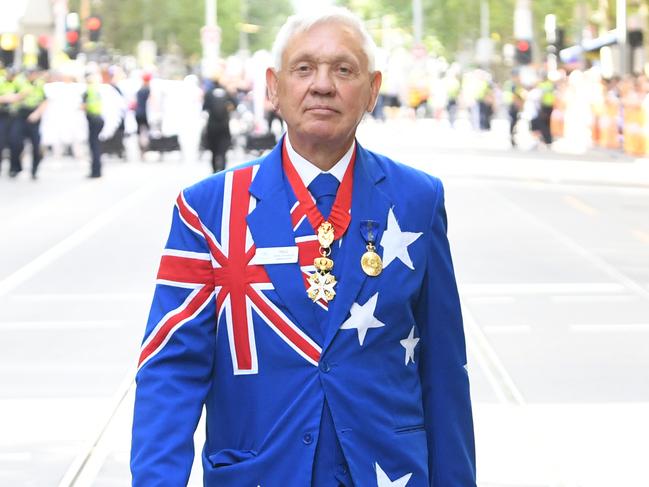 An Australia Day attendee poses for a photograph during the celebrations in Melbourne. Picture: AAP