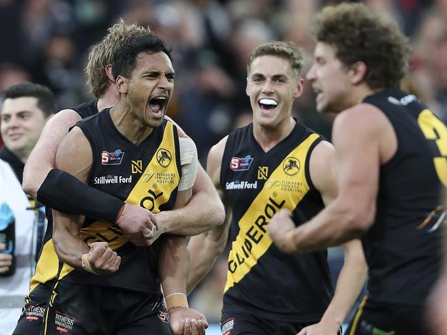 SANFL - GRAND FINAL  22/09/19 - Port Adelaide v Glenelg at Adelaide Oval. Marlon Motlop celebrates his goal late in the 4th  - with Carl Nicholson and Matthew Snook Picture SARAH REED