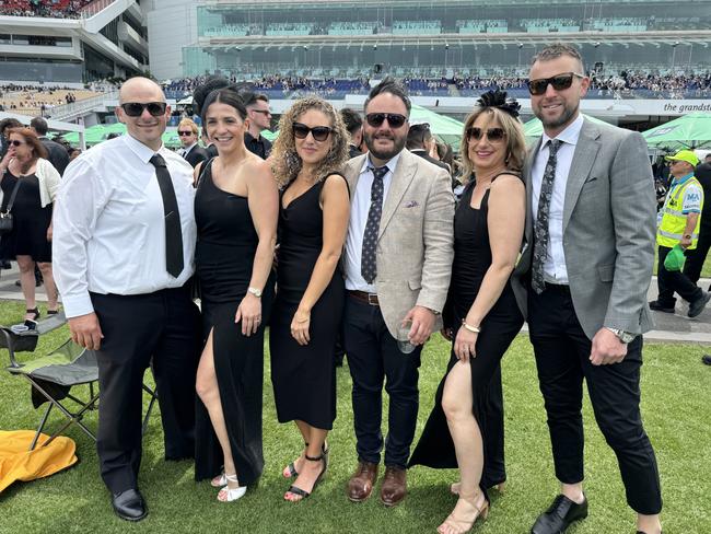 Sam Sozzi, Angela Sozzi, Cathy Raso, David Raso, Amanda Finocchiaro and Andrew Finocchiaro at Flemington for Derby Day on November 2, 2024. Picture: Phillippa Butt