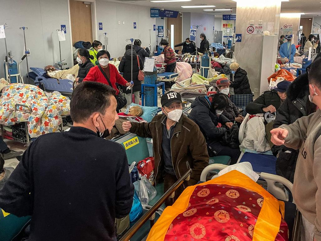 Hospital lobbies collected overflowing patients, but Chinese officials continue to deny surging case numbers. Picture: Hector Retamal / AFP.