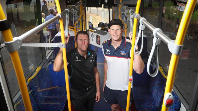 Power’s Brad Ebert and Crows Sam Jacobs on a MAC Bus during a press conference at Montefiore Hill in North Adelaide.