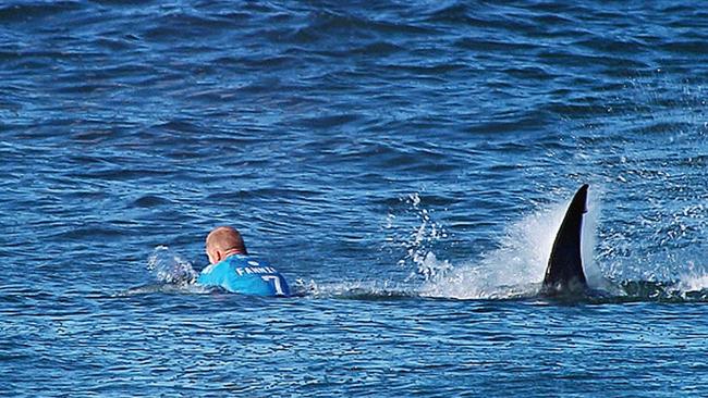 2015: It is one of the most extraordinary things ever caught on film. Aussie surfer Mick Fanning was waiting for a wave at the Jbay Open in South Africa when he was attacked by a shark. He escaped after punching it in the face. Picture: WSL/Getty Images