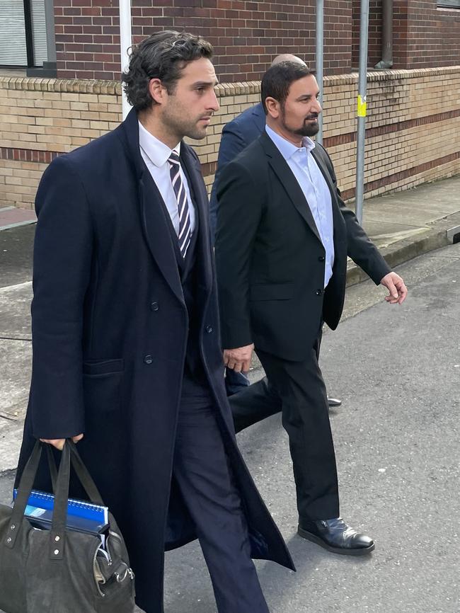 Mr Nassif (right) leaves court with his legal team. Picture: NewsLocal