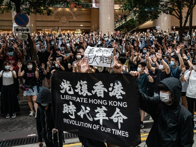 HONG KONG, CHINA - JULY 01: Demonstrators take part in a protest against the new national security law on July 1, 2020 in Hong Kong, China. Hong Kong marks the 23rd anniversary of its handover to China on July 1 after Beijing imposed the new national security law. (Photo by Anthony Kwan/Getty Images)