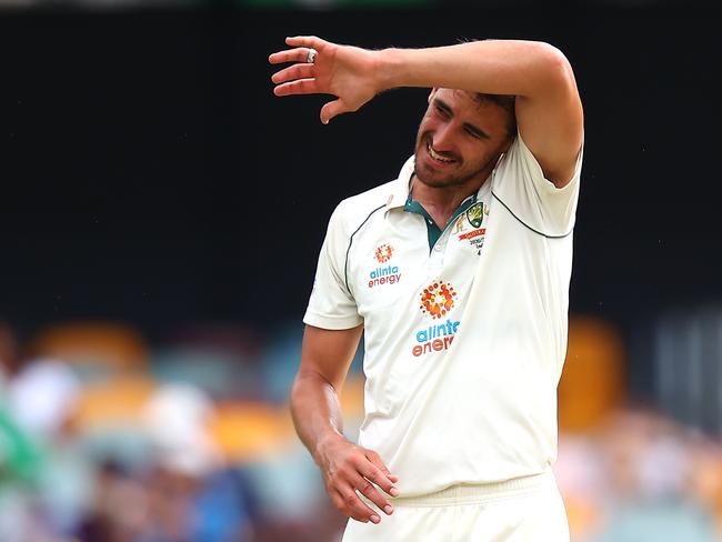 Australia's paceman Mitchell Starc reacts after bowling on day five of the fourth cricket Test match between Australia and India at The Gabba in Brisbane on January 19, 2021. (Photo by Patrick HAMILTON / AFP) / --IMAGE RESTRICTED TO EDITORIAL USE - STRICTLY NO COMMERCIAL USE--