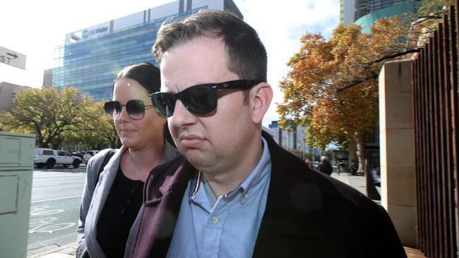 Ben Waters, centre, outside court. Picture: NCA NewsWire / Kelly Barnes.