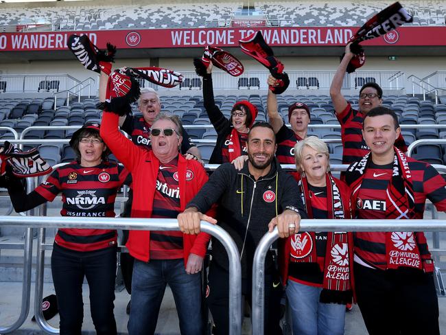 BankWest stadium in Parramatta will convert 3 bays of seating into 'safe standing' areas for fans to be able to support their teams while standing and cheering. Wanderers fans get a first look at the new area with Wanderers star Tarek Elrich. Picture: Toby Zerna