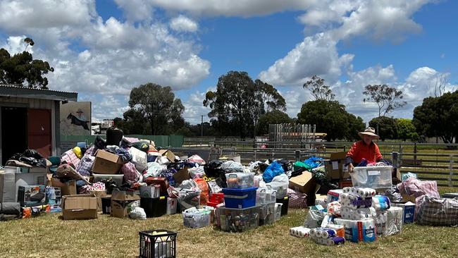 Sorting through donations at Eugowra Showground.