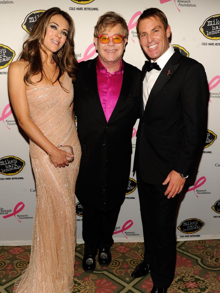 Sir Elton John reportedly introduced Warne to Liz Hurley. (Photo by Kevin Mazur/WireImage)