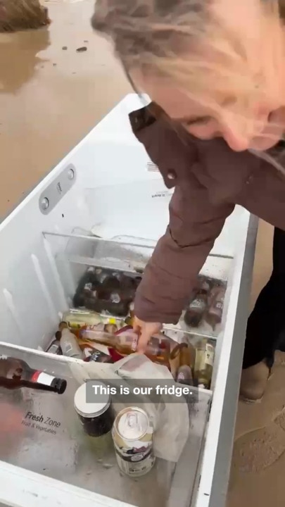 Shocked flood victim finds own fridge washed up on beach 70km away