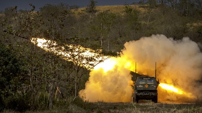 US and Philippine troops fire a High Mobility Artillery Rocket System (HIMARS) during live fire exercises in Laur, Nueva Ecija, Philippines, last month. Australia’s surface-to-surface PrSMs can be fired from the US-made HiMARS launchers. Picture: Getty Images