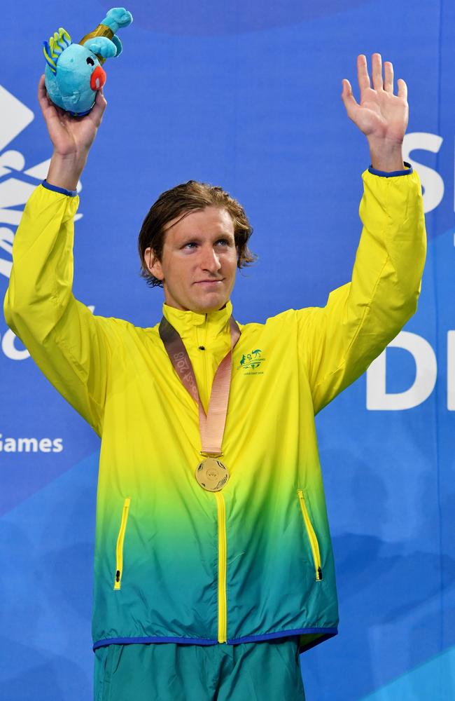 Gold medallist Jack McLoughlin celebrates his 1500m win.