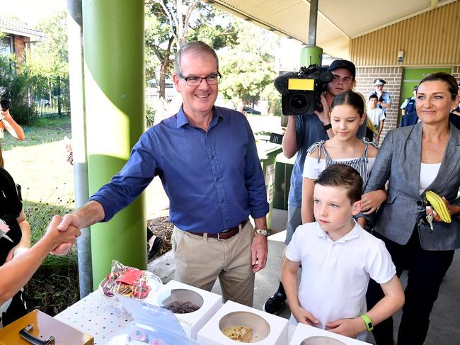 NSW Opposition Leader Michael Daley with wife Christina and children Olivia and Austin at Chifley Public School in Malabar. Picture: AAP Image/Joel Carrett)