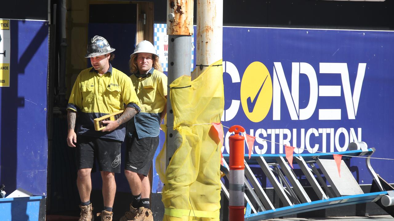 Workmen at the Condev project, Natura, at 112 The Esplanade, Burleigh Heads. Picture Glenn Hampson