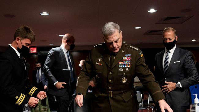 US Army General Mark A. Milley, Chairman of the Joint Chiefs of Staff, centre, departs a Senate Armed Services Committee hearing at the Dirksen Senate Office building in Washington, DC, on September 28. Picture: AFP