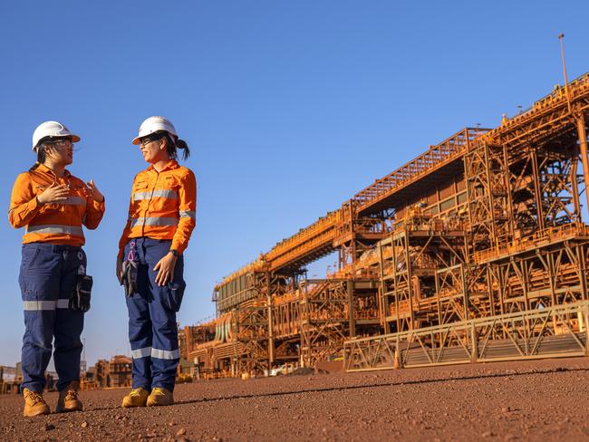 Engineer Reita Guo and Technical Specialist Annaleise Prowse at BHP’s Jimblebar iron ore mine in the Pilbara region, Western Australia. Photo taken by Evan Collis in November 2020.