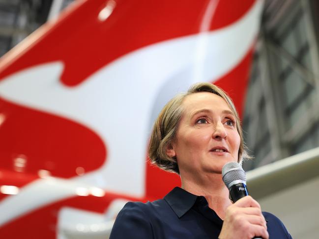 SYDNEY, AUSTRALIA - FEBRUARY 22: Qantas chief executive Vanessa Hudson speaks during a media opportunity at Hangar 96, Qantas Sydney Jet Base on February 22, 2024 in Sydney, Australia. Qantas has demonstrated a significant financial turnaround, reporting a record $2.47 billion profit for the 2022-23 fiscal year, marking a stark change from the previous year's $1.86 billion loss. The airline's strong performance was attributed to robust travel demand and high ticket prices, with domestic earnings before interest and taxes (EBIT) jumping to 18.2%, representing a 50% increase in profit margins over the past six years. The company's return on invested capital also increased to 103.6%, reflecting its improved financial position and operational performance. (Photo by Jenny Evans/Getty Images)