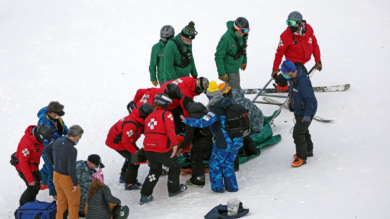 McQuinn is taken away by a stretcher after a crash during his run for the Men's Mogul Finals. (Photo by Tom Pennington/Getty Images)