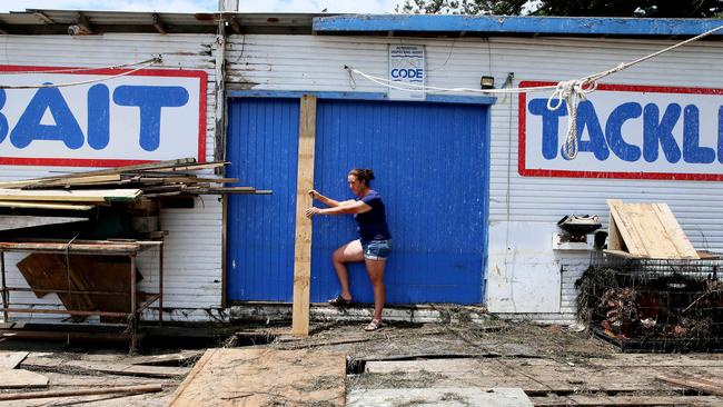 The Entrance Boat Shed owner Toni Moon at the iconic business which has been gutted from the flooding. Picture: Sue Graham