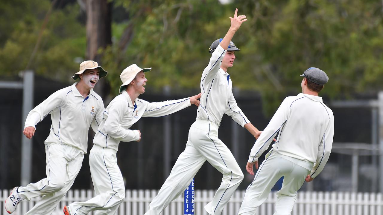 Churchie players celebrate a wicketicture, John Gass.