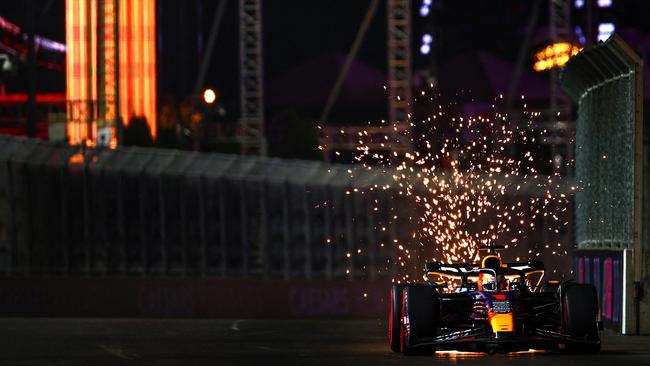 Sparks fly from the car of Max Verstappen. Picture: Jared C. Tilton/Getty