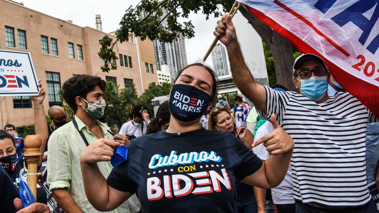 Supporters of the Democratic party celebrate in Miami after Joe Biden was declared the winner. Picture: Chandan Khanna/AFP