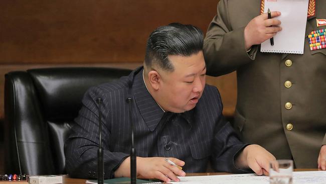 Kim Jong-un chairs a meeting of the Central Military Commission on Monday. KCNA via AFP