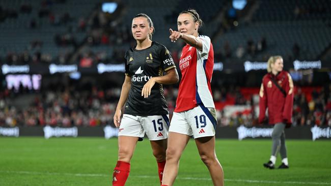 Katie McCabe of Arsenal and Caitlin Foord of Arsenal thank fans after the exhibition match between A-League All Stars Women and Arsenal Women FC at Marvel Stadium. Picture: Daniel Pockett/Getty Images