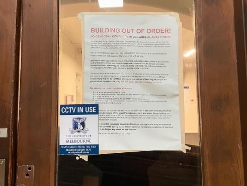 A sign posted on the doors to the Old Arts building at Melbourne University's Parkville campus. Picture: Instagram