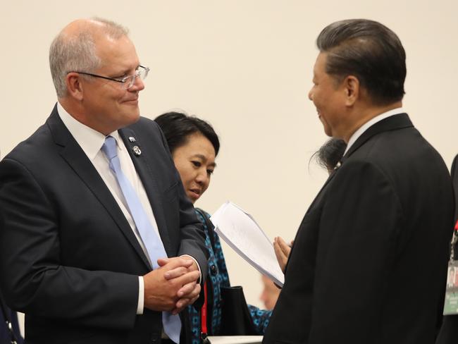 Scott Morrison and Chinese President Xi Jinping. Mr Morrison said he meant to “compliment” not “criticise” China when he urged it to shoulder more international responsibilities. Picture: PMO