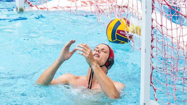 Nic Porter lets a ball through in the Queensland Premier League Water Polo semi-finals. He will be on song in Sunday’s grand final for Warriors. Picture: Richard Walker