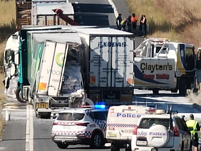 The scene of a three truck crash at Granite Creek, South of Miriam Vale on the Bruce Highway that occurred overnight.