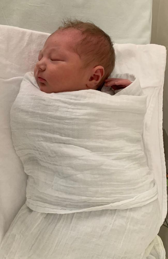 Beau looking very peaceful after he was born.