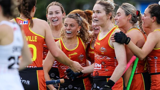 The Hockeyroos swamp Rosie Malone after her equaliser against the Black Sticks. Picture: BW Media