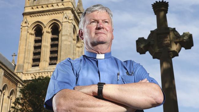 AFL - GOOD FRIDAY FOOTY - Dean of St Peters Cathedral - Frank Nelson isn't happy about Good Friday Football. Picture SARAH REED