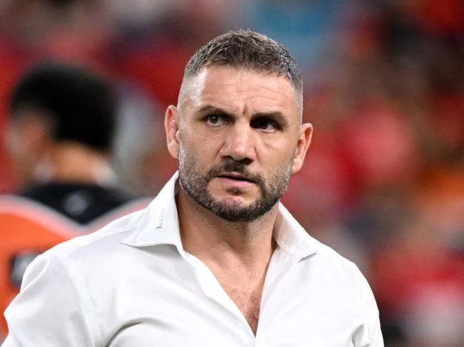 BRISBANE, AUSTRALIA - APRIL 06: Robbie Farah assistant coach of the Wests Tigers is seen during the warm up before the round 5 NRL match between the Dolphins and the Tigers at Suncorp Stadium, on April 06, 2024, in Brisbane, Australia. (Photo by Bradley Kanaris/Getty Images)