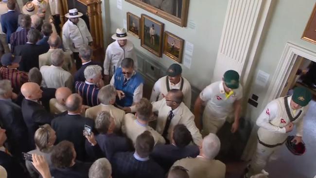 Australian players are heckled as they walk past MCC members at Lords after the dismissal of English batsman Jonny Bairstow. Picture: Nine Wide World of Sports