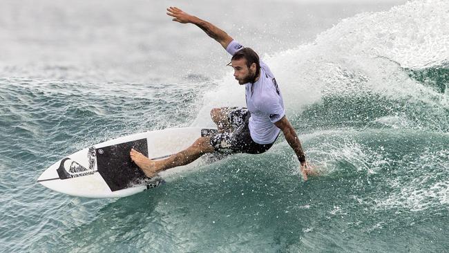 Mikey Wright in action in round one of the Quiksliver Pro at Snapper Rocks.