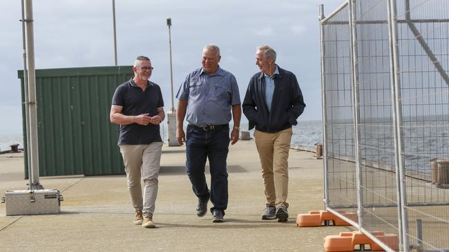 YP mayor Darren Braund, YP councillor Mick O'Connel, Edithburgh progress association chairman Stan Szczypiorski walking past a fenced off section of jetty. Picture: Brett Hartwig
