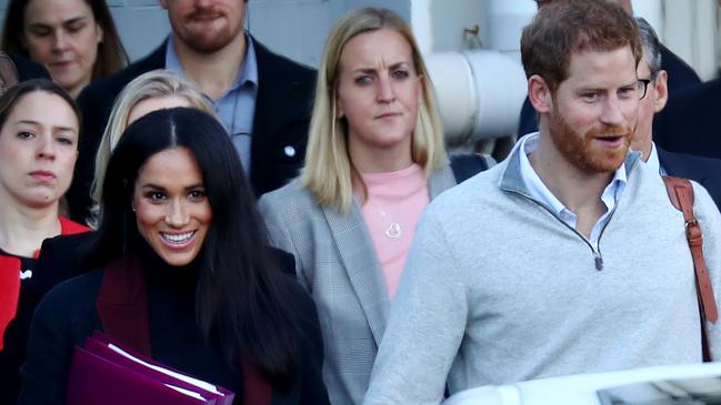 Meghan and Prince Harry arrive at Sydney International Airport. Picture: Hollie Adams.