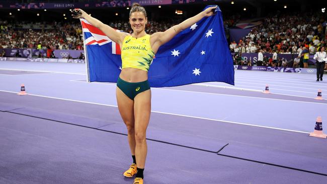 Nina Kennedy celebrates winning the gold medal in the women's pole vault final. Picture: Getty Images